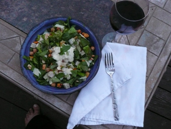 Salad and wine on the patio