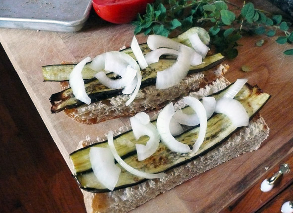 Broiled eggplant on toast with onions