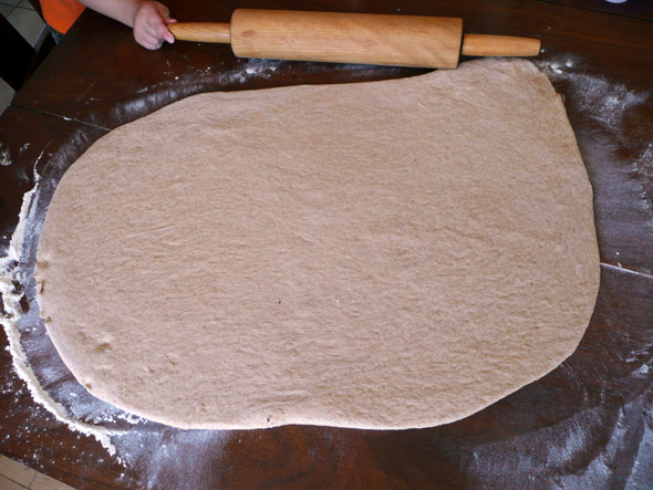 Rolling out the dough for the caramel rolls
