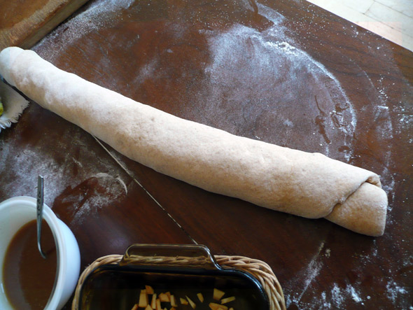 The rolled up dough for the caramel apple rolls