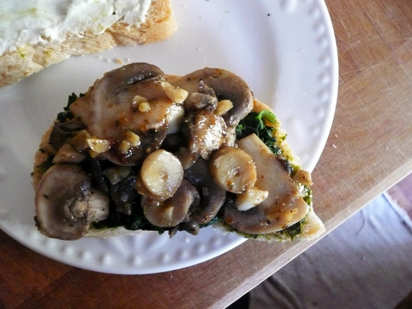 Top with spinach and mushrooms