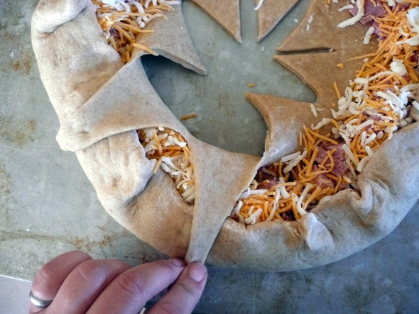 Ham and Cheese Stuffed Bread Wreath: pull the points of the "star" out to the edge and tuck the ends of the dough underneath