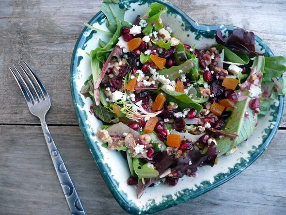 Pomegranate Walnut Salad with dried cranberries, apricots, mixed cheeses and Maple Cranberry Vinaigrette