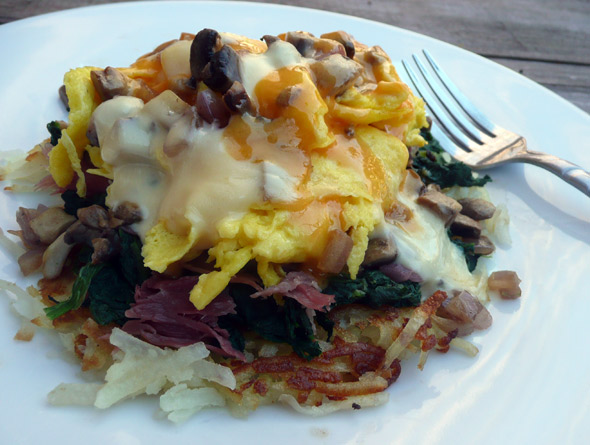 Hashbrowns Supreme with Spinach, Prosciutto, Mushroom, Onion, Egg, and Gouda and Sharp Cheddar Cheese