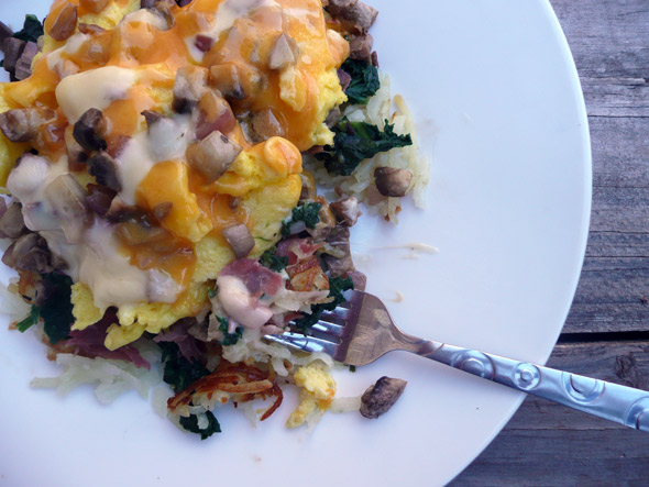 Hashbrowns Supreme with Spinach, Prosciutto, Mushroom, Onion, Egg, and Gouda and Sharp Cheddar Cheese