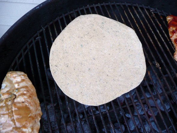 Grilling Pizza: set the crust on the "hot" side of the grill to cook