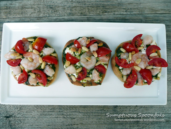 Pesto Shrimp Mini Pizzas with Grape Tomatoes, Goat Cheese & Pinons