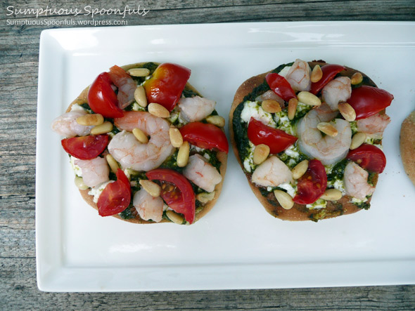 Pesto Shrimp Mini Pizzas with Tomato, Goat Cheese, and Pinons