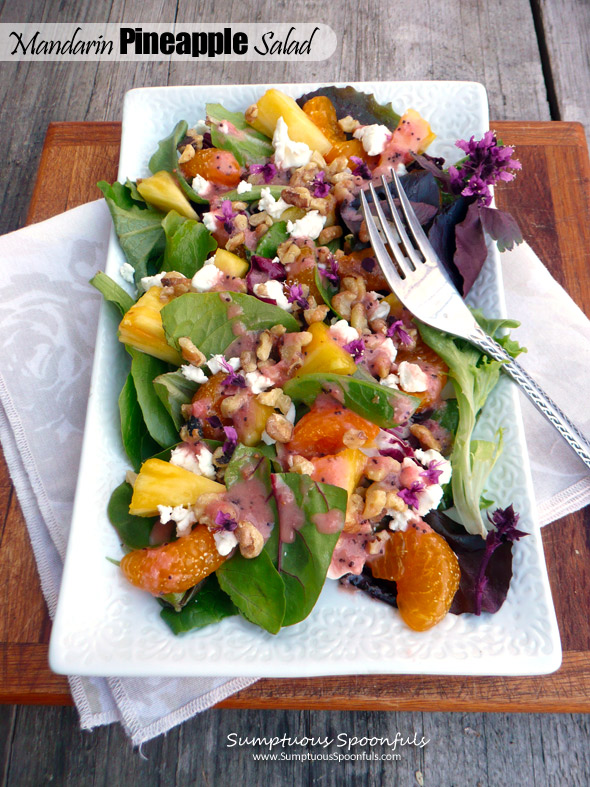 Mandarin Pineapple Salad with Basil Flowers, Toasted Walnuts & Goat Cheese and a fresh Strawberry Vinaigrette ~ Sumptuous Spoonfuls #salad #recipe