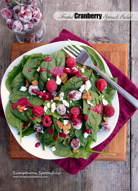 Frosted Cranberry Spinach Salad with candied walnuts, goat cheese & cranberry raspberry vinaigrette ~ Sumptuous Spoonfuls #cranberry #raspberry #holiday #salad #recipe