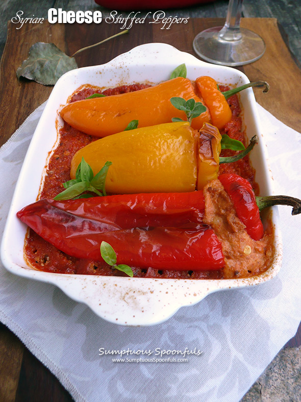 Syrian Cheese Stuffed Peppers ~ mini sweet peppers stuffed with a magical cheese mixture over flavorful Romesco sauce