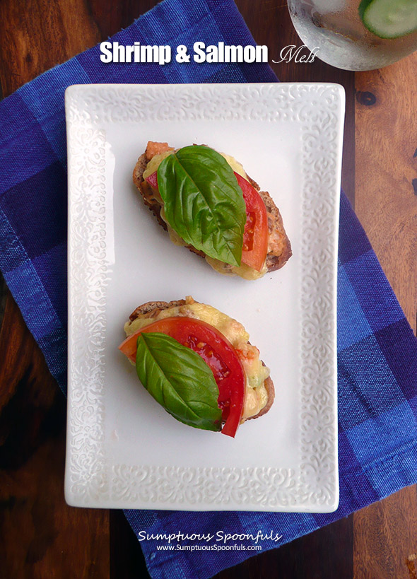 Shrimp & Salmon Melt ~ a dreamy combination of smoked salmon and shrimp with red onion, cream cheese, sundried tomato pesto, herbs & pecans with melty white cheddar, tomato and basil, this sandwich will be your new favorite! 