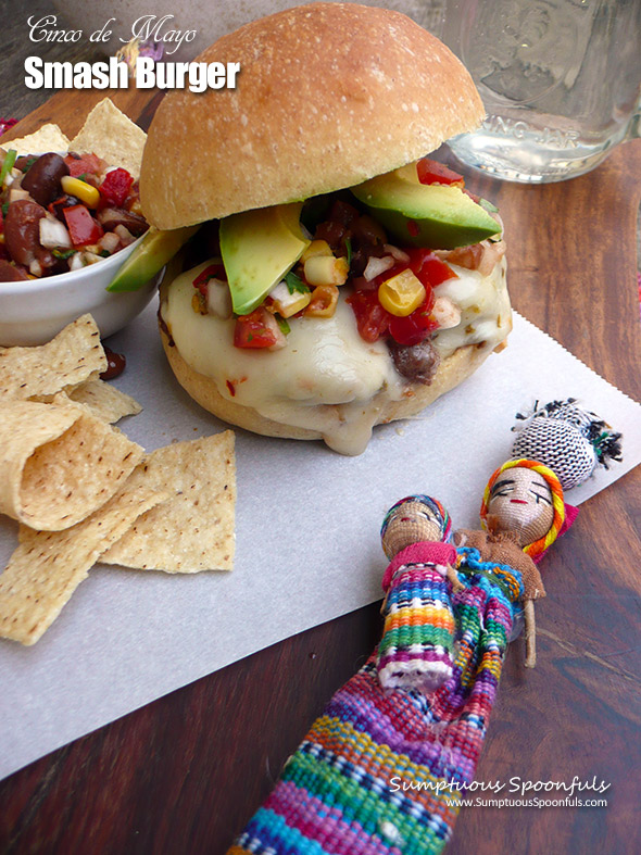 Cinco de Mayo Smash Burger ~ Quick Easy Smash Burgers with a Mexican twist! Top off your burger with pepper jack cheese, cowboy caviar and avocado and you have yourself a burger worth celebrating!