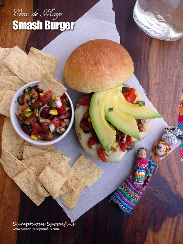 Cinco de Mayo Smash Burger ~ Quick Easy Smash Burgers with a Mexican twist! Top off your burger with pepper jack cheese, cowboy caviar and avocado and you have yourself a burger worth celebrating!
