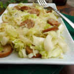 Bangers with Beer Braised Cabbage ~ Sumptuous Spoonfuls #lowcarb #Irish #sausage #recipe