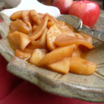 Bourbon Apples ~ tender apples bathing in a cinnamon bourbon butter sauce. Amazing on French toast, pancakes or ice cream.