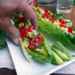 Sriracha Tuna Lettuce Wraps ~ tuna salad takes on a whole new life with the kick of Sriracha, then tucked into crunchy lettuce with tomato & avocado